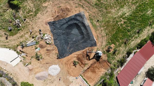 Mise en place de l'EPDM du bassin